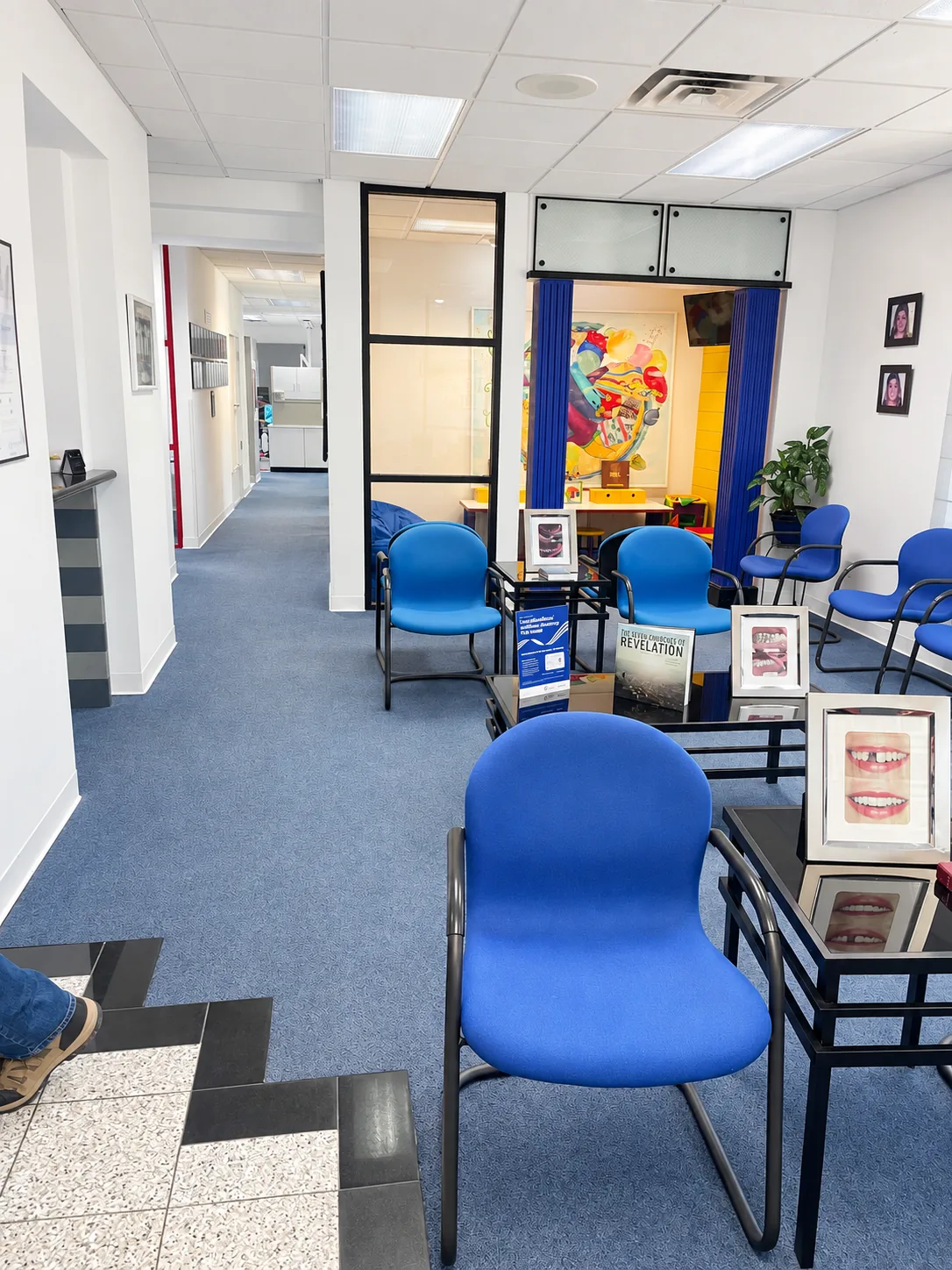 Waiting room and clinical hallway at Longbranch Dental Center, a dentist near Campbell, TX